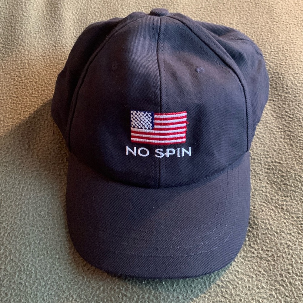 Bill O’Reilly No Spin navy hat w/embroidered American flag. Hook & loop closure